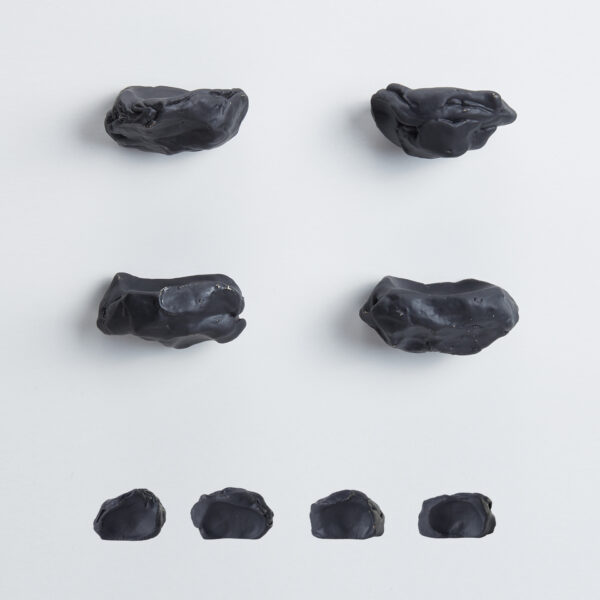 pomello di design pomello per mobili pomello ottone acidato nero modello impronta pietra by niva design
